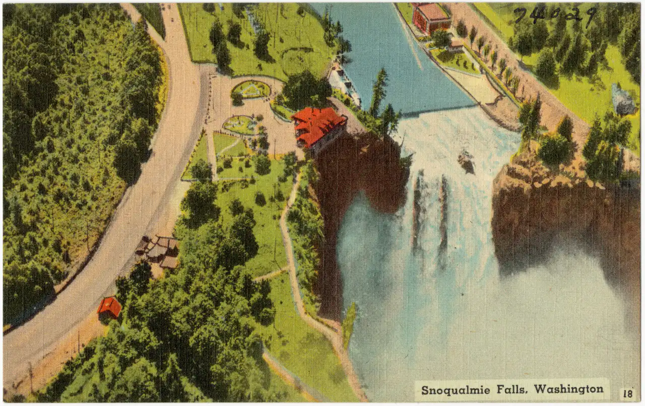 A colorized linen postcard showing the falls, the lodge and the road from above